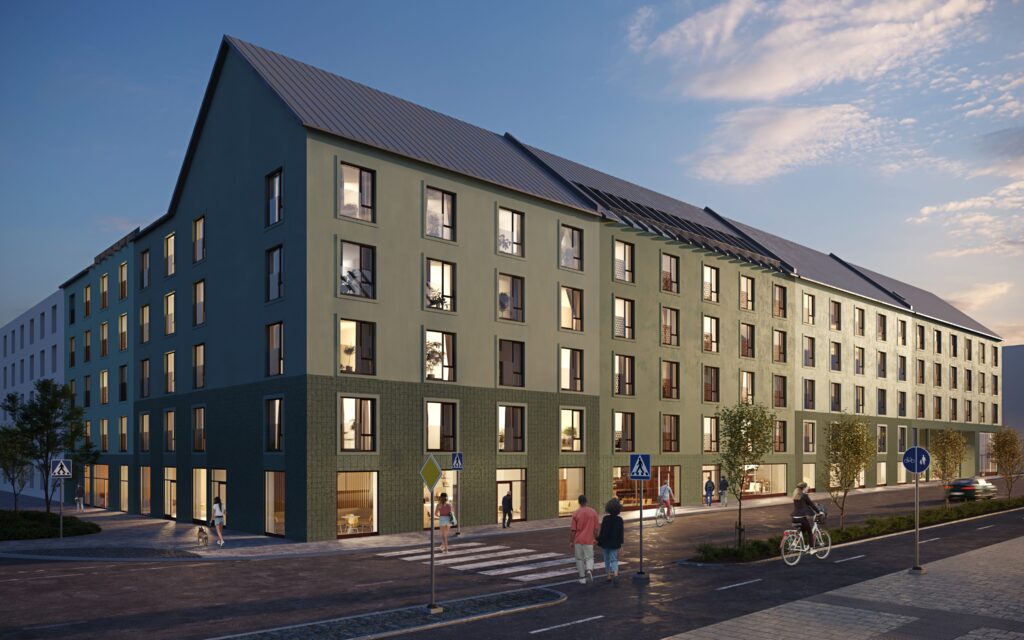 Exteriör Campus Elsa, ett grönt hus i fem våningar längs med en trafikerad gata